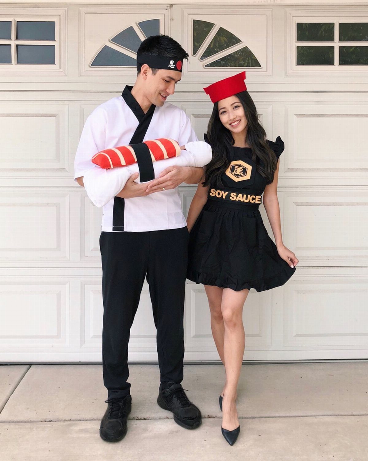 Family in sushi-themed costumes with a baby dressed as a piece of nigiri.