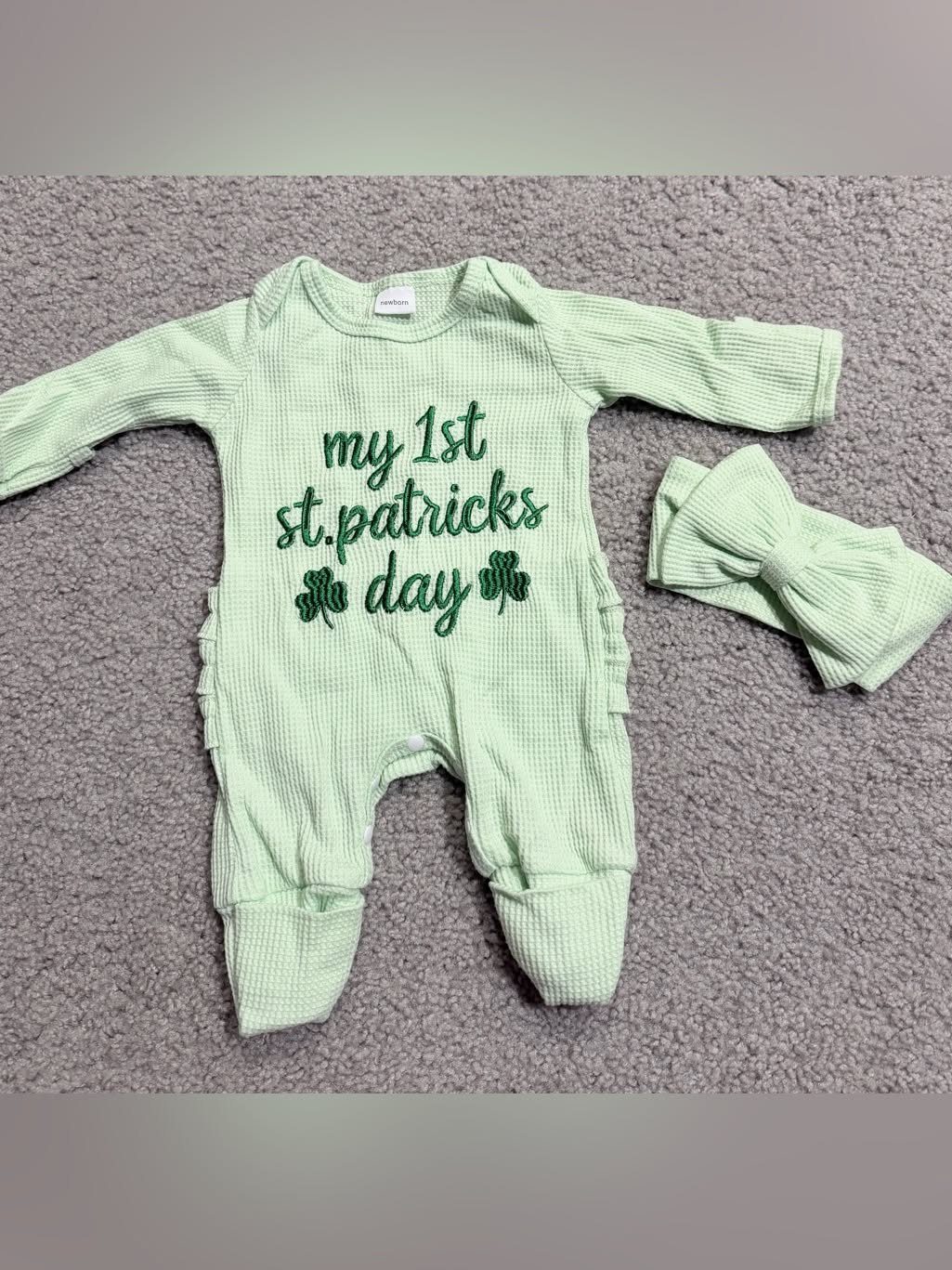 Infant St Patty's Day Clothing: 7 Ideas for Baby 4 Light green infant St. Patrick's Day sleeper and matching bow headband on grey background.