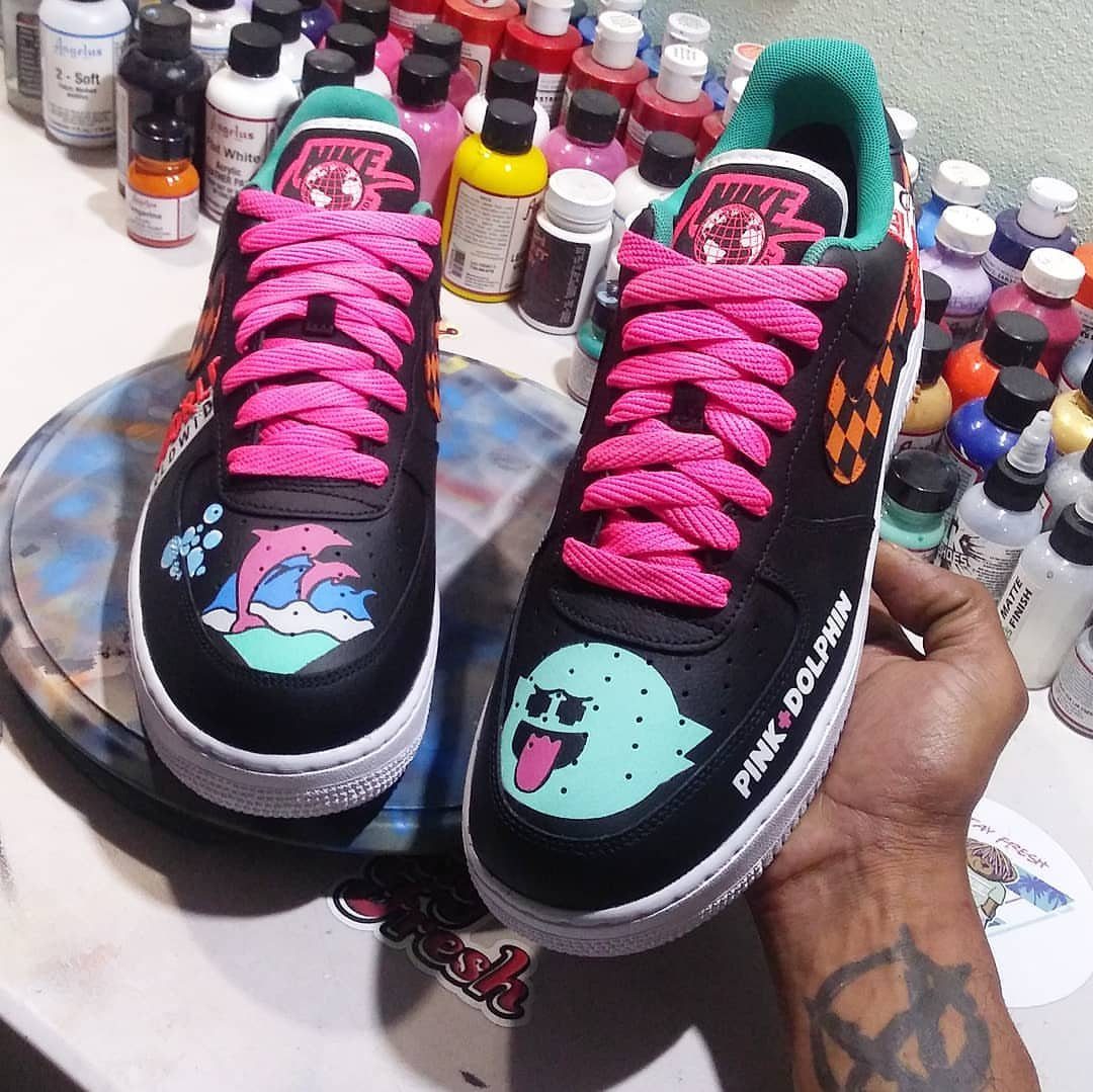 Pink Dolphin Clothing: 7 Ideas for Hoodies, Hats and More 7 Custom black Nike sneakers with pink laces and pink dolphin painted graphics.